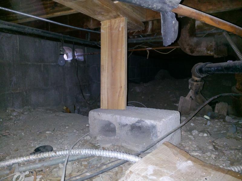 The photo shows an example of improper structure holding up floor.